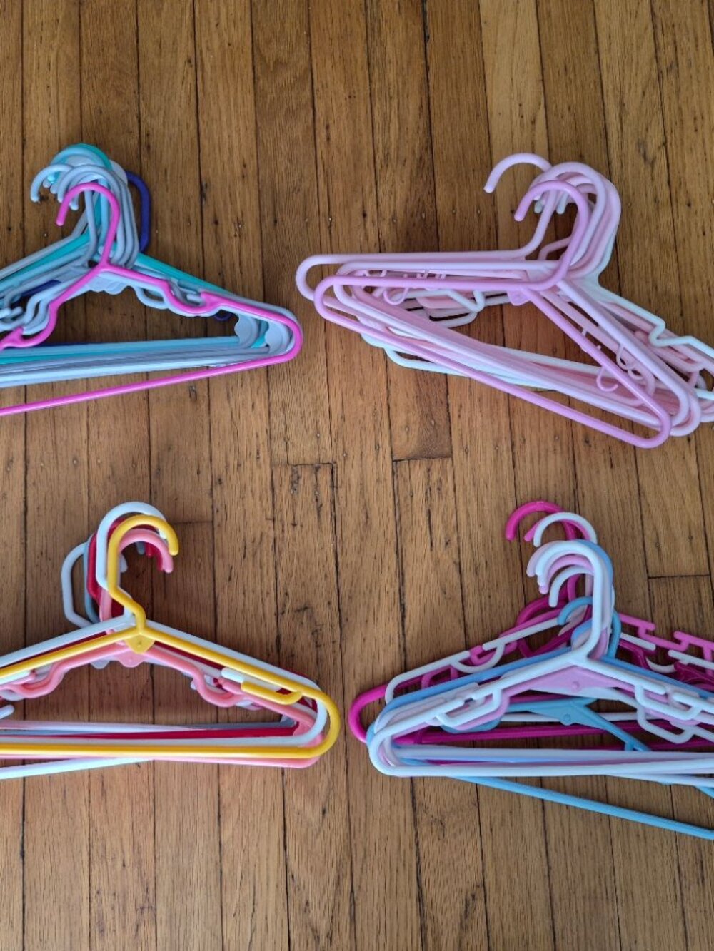 4 Dozen (48) Plastic Multi colored Kid's Plastic Hangers